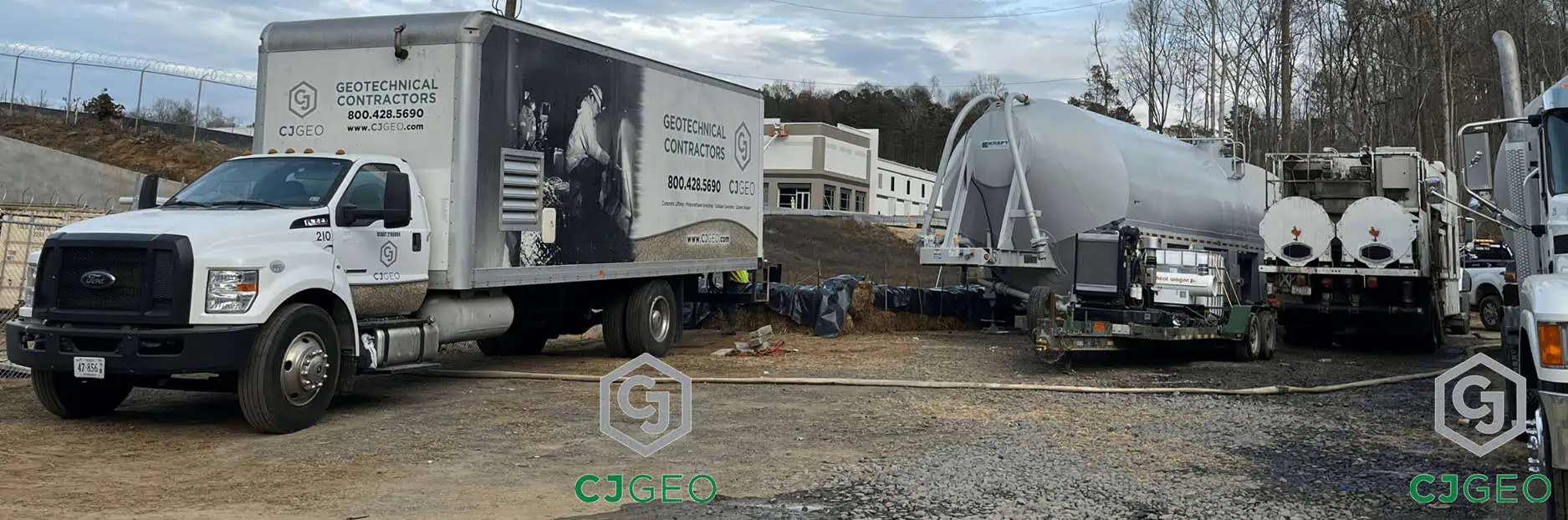 CJGeo's specialized dry batch cellular grouting equipment, including a work truck and bulk tanker, staged at the Charlotte airport for the Paw Creek pipe abandonment.