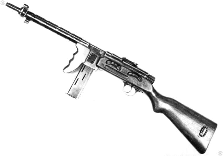 The left side of the Atlantic submachinegun. The long slits in the side of the magazine are to see the quantity of rounds remaining. On the stock, just below the main body of the receiver, are the curved cuts in the stock to reach the controls for the weapon. With both the front and rear lever in the forward position and the forward [position, as seen here, the weapon fires semiautomatically. With the front lever in the forward position and the rear lever in the rearward position, the weapon is on safe. With the front and rear lever forward, the weapon fires on full automatic. PHOTO CREDIT: US Army