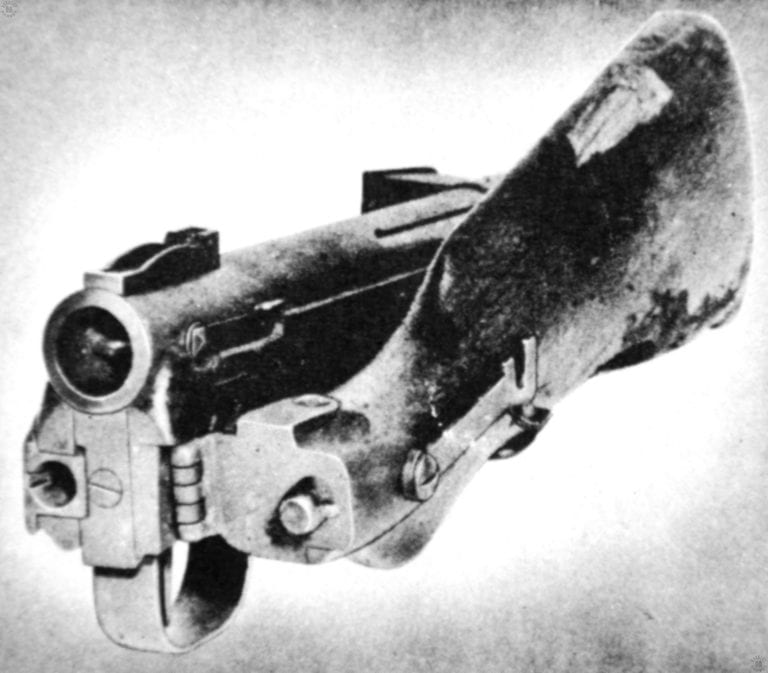 This shows the Paratrooper version of the Type 100 with the stock fully folded to the right side of the weapon. The purpose for this style of stock is to minimize the overall size of the weapon for use by paratroopers. The weapon may not be fired with the stock folded in this position. PHOTO CREDIT: US Army