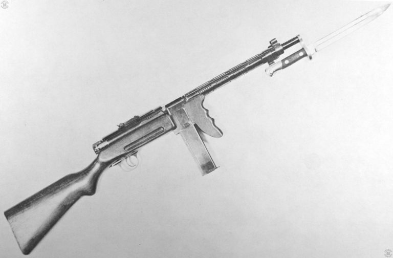 This is the right side of the Atlantic submachinegun with a magazine in place and a bayonet fixed. The weapon is a slightly modified Spanish Star model T.N. 35 imported by the Atlantic Importing Company of New York with the intent of submitting the weapon to the US Army for consideration. The cocking knob can be seen just above and behind the magazine well and ejection port. PHOTO CREDIT:US Army