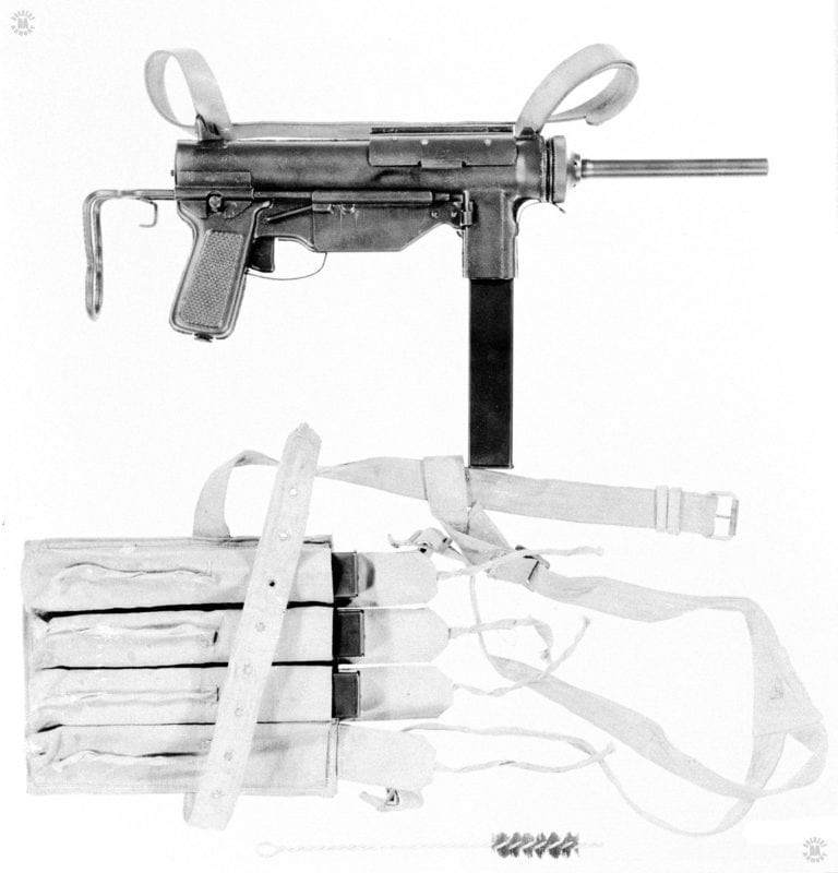 This is the Chinese Type 37 submachinegun, produced by the Nationalist Chinese towards the end of WWII. The weapon is an exact copy of the 9mm M3A1 submachinegun and also used the standard Sten magazine. The pouch holds four magazines and a cleaning rod. The loading tool on the sliding stock is sized to work with the Sten magazines. PHOTO CREDIT: US Army