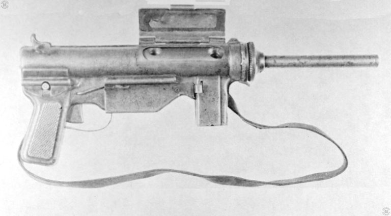 This specimen of the Type 37 submachinegun produced by the Nationalist Chinese has had its sliding stock removed. With the ejection port cover open, the weapon can be seen to operate exactly like the US M3A1 submachinegun. PHOTO CREDIT: US Army