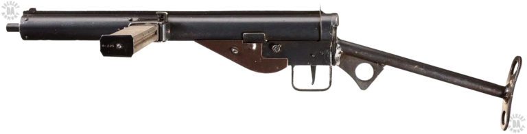 The left-side view of an excellent example of a Sten Mk III. The extreme simplicity of the design is seen in the clean lines of the weapon. The only flaw in the smooth lines of the weapon is the large weld on the front of the No 2 Mk II “T” buttstock. This type of welding was seen in much of the early and mid-war production of the Sten series. PHOTO CREDIT: ROCK ISLAND AUCTIONS