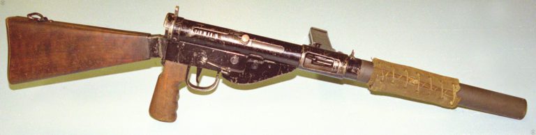 The Mk VI Sten in the cocked and ready to fire position. The magazine is empty, as can be seen in the open ejection port. PHOTO CREDIT: KEVIN DOCKERY