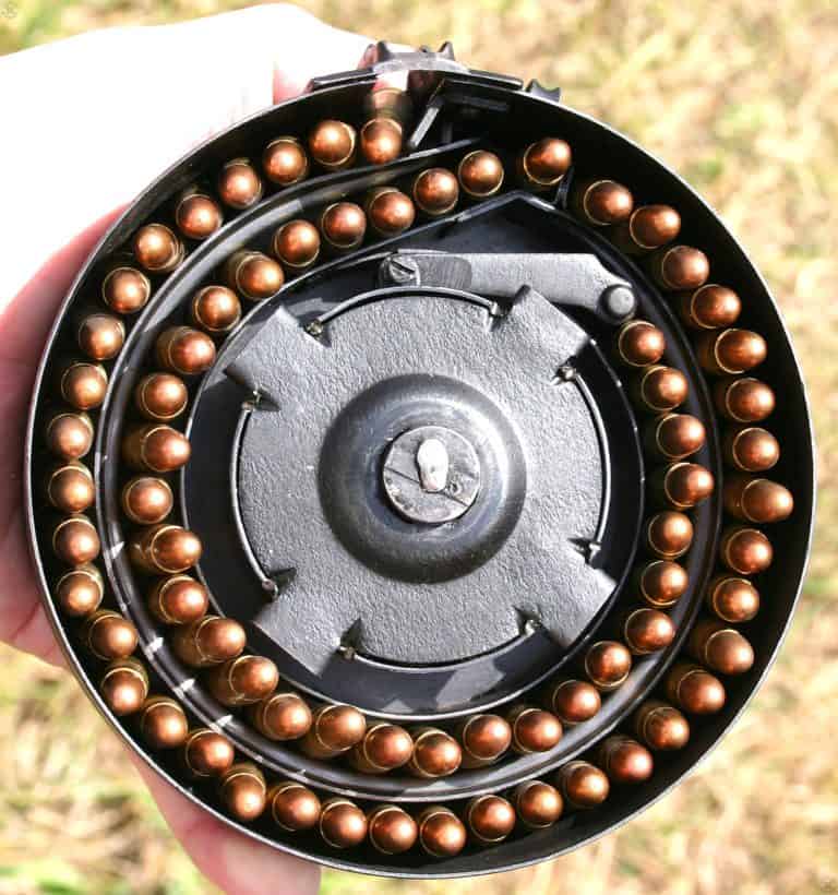 A straight-on view of an open, loaded, PPSh-41 drum magazine. PHOTO CREDIT: KEVIN DOCKERY