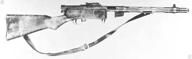 The right side of a Suomi Model 1931 submachinegun with the wartime compensator in place. The compensator is secure on the front portion of the barrel jacket. PHOTO CREDIT: US ARMY