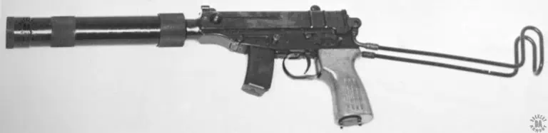 The Vz-61 Skorpion fitted with the original suppressor designed for it. The suppressor mounts to the exposed barrel of the Skorpion with a 3-jaw collet that is tightened by the knurled ring at the barrel-end of the suppressor. This specimen has the stock unfolded and is loaded with a 10-round magazine. PHOTO CREDIT: DEFENSE INTELLIGENCE AGENCY