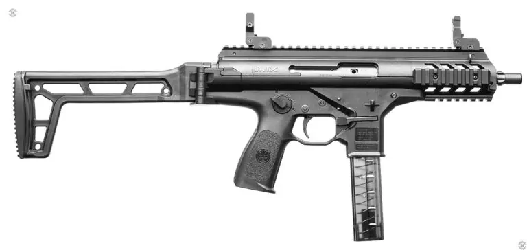The right-side of a Beretta PMX with the stock extended and locked in place. It can be seen that the safety/selector switch, above and behind the trigger, as well as the magazine catch in front of the trigger, are duplicated on this side of the weapon. The +shaped part above the front of the magazine catch is the stock catch that helps hold the stock securely in the folded position. PHOTO CREDIT: BERETTA DEFENSE TECHNOLOGY