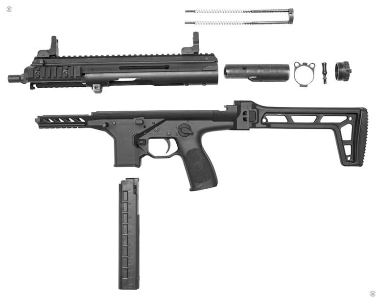 A left-side view of the Beretta PMX field-stripped for maintenance. At the top of the illustration is the twin mainspring assembly. The barreled upper receiver is at the top left front of the illustration. Behind the upper receiver assembly is the bolt. Behind the bolt is the locking ring that helps secure the receiver cap as well as holding two sling attachment points, the small loops at the top of the part. Behind the locking ring is the bolt handle that can be switched by the operator to either side of the weapon. The last part behind the bolt handle is the threaded receiver cap that closes off the upper receiver.
      The lower receiver assembly that extends the width of the illustration holds all of the major controls of the weapon as well as the stock assembly. Below the lower receiver is a 30-round translucent plastic magazine for the PMX. PHOTO CREDIT: BERETTA DEFENSE TECHNOLOGY