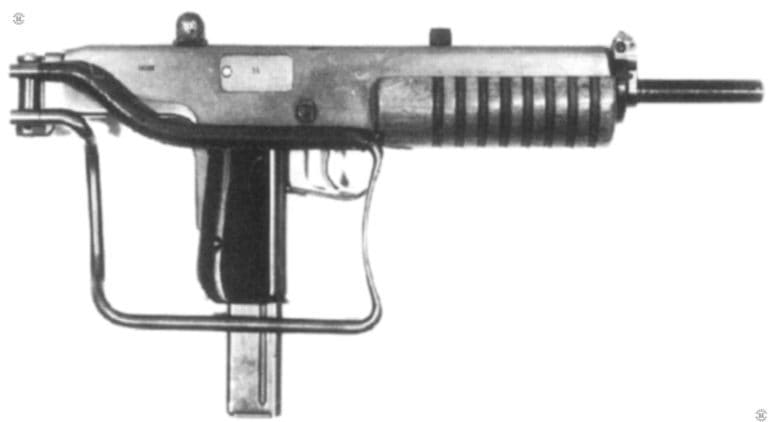 The paratrooper version of the ZK-476 submachine gun. The grooved wooden fore end is shorter than that found on the Infantry version of the weapon. The metal-tubing stock is folded in to the right side of the weapon. The long piece at the back side of the pistol grip is an extended grip safety. PHOTO CREDIT: CZECH REPUBLIC