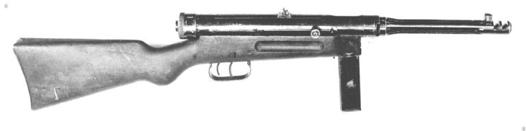 The right side of the Beretta 38/42 showing how the weapon is fairly well sealed against dirt and debris. With the magazine inserted, in this specimen a 20 rounder, and the bolt in the forward position, the only means for dirt and such to enter the weapon is down the barrel. PHOTO CREDIT: US Army