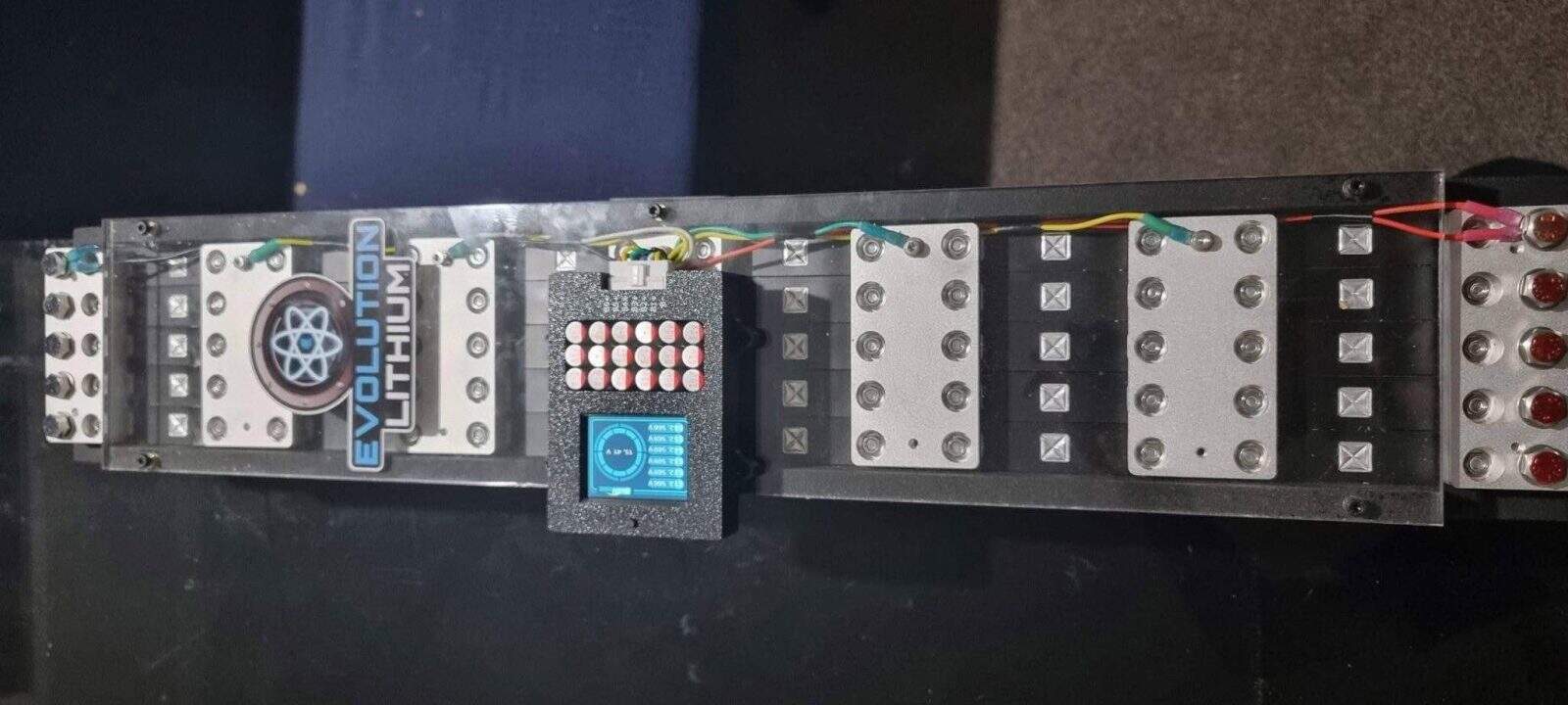 Evolution lithium battery with control display and wiring.