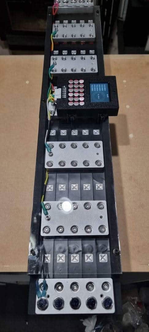 Electronic circuit board with various components.