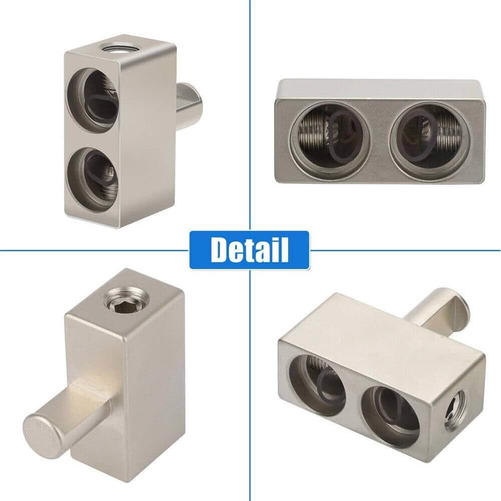 Four views of the Dual 1/0 Gauge to 1/0 Gauge Amp Input Reducers with cylindrical openings are shown from different angles on a white background. The word Detail is centered in blue on the image.