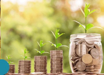 Stacks of coins and a jar of savings with small plants growing from them