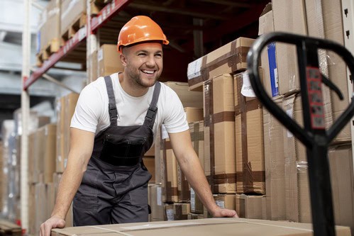 medium-shot-smiley-man-warehouse (3) (1) (1)