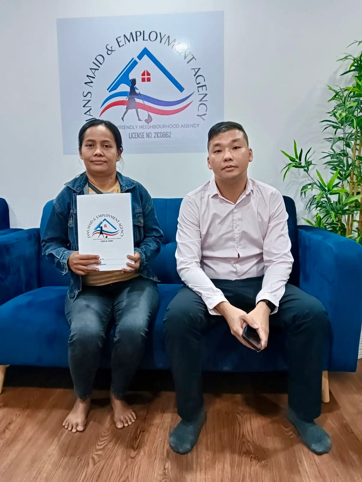 Happy family after successful helper placement in Singapore