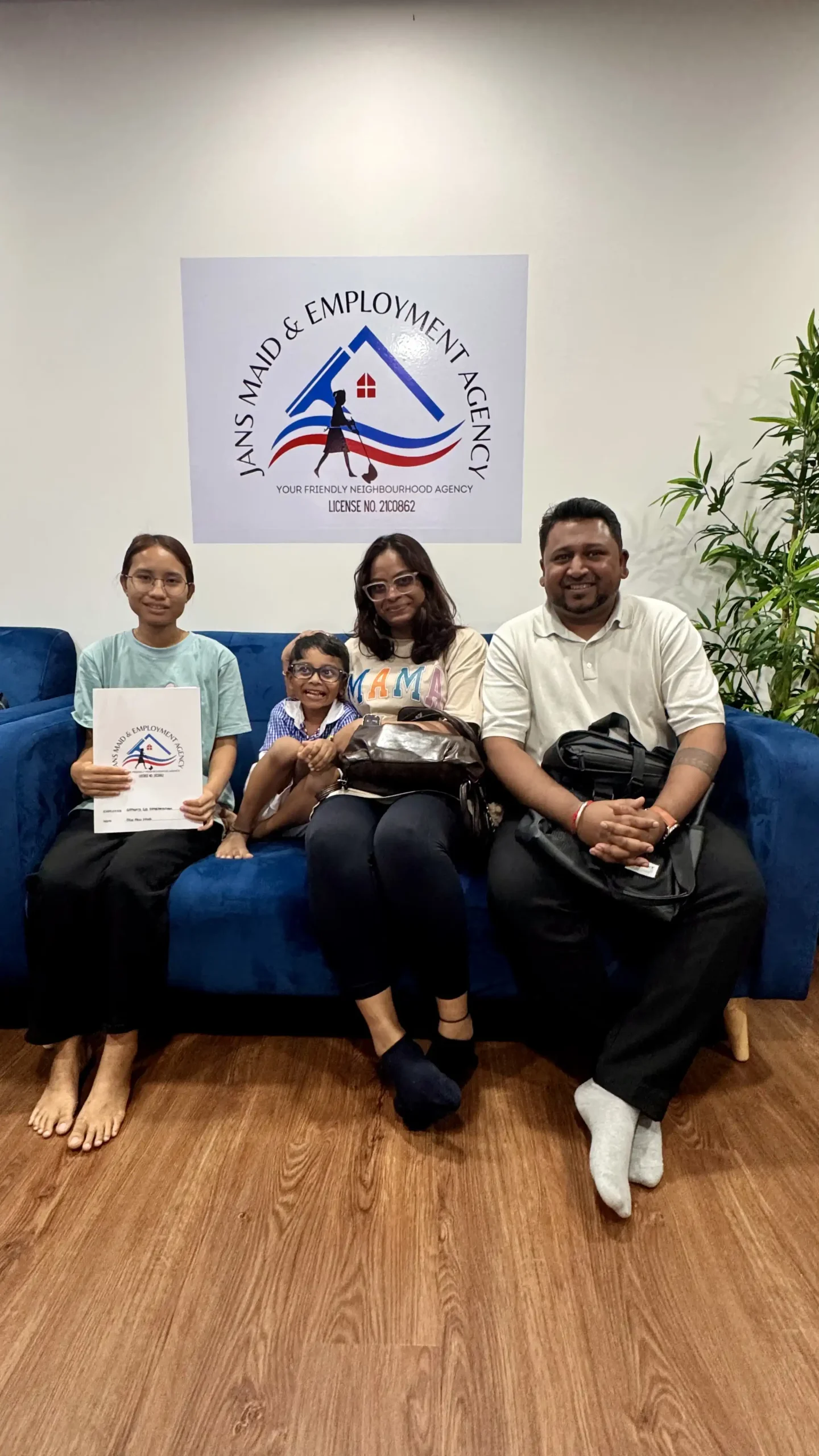 Agency consultant explaining MOM paperwork to Singapore clients