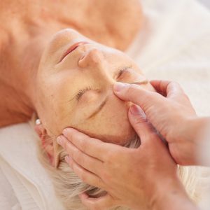 Relax, head massage and senior woman at a spa for luxury, self care and muscle healing treatment. Health, wellness and elderly female person on a retirement retreat for body therapy at natural salon. Relax, head massage and senior woman at a spa for luxury, self care and muscle healing treatment. Health, wellness and elderly female person on a retirement retreat for body therapy at natural salon.