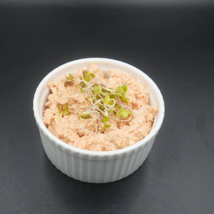 A bowl of tuna salad with sprouts, a dish from Polish cuisine.