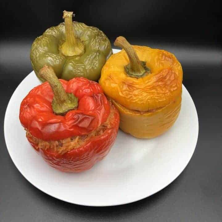 Polish Stuffed Peppers Recipe [Papryka Faszerowana] with fresh ingredients and vibrant colors.