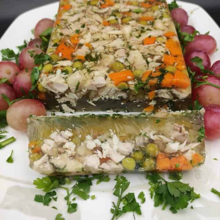 Chicken aspic made with peas and carrots.