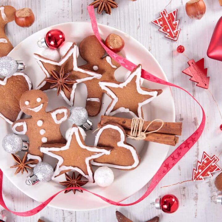 Polish gingerbread cookies on a plate with red and white decorations.