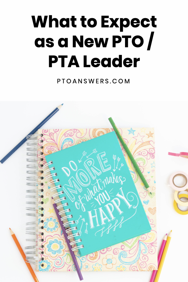 colorful notebooks and planners on white desktop
