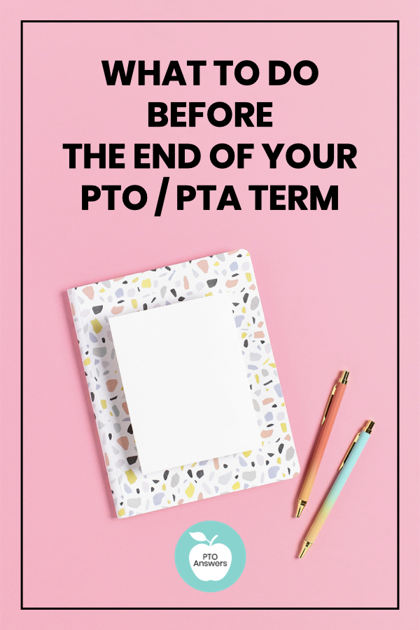 colorful notepads and pens on pink background