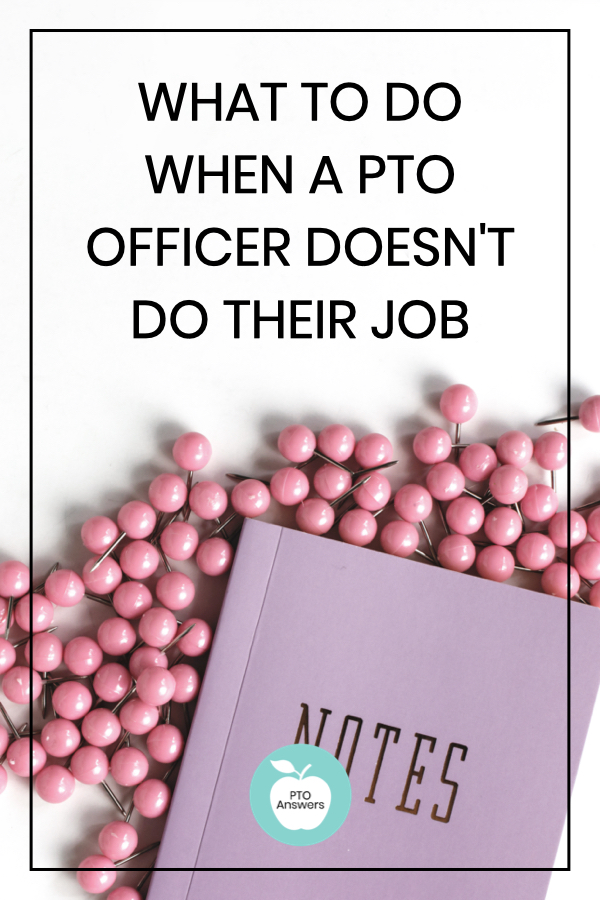 purple notebook surrounded by pink pushpins on white desktop