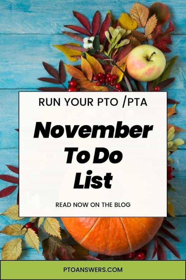 fall inspired foliage, apple and pumpkin floral spray atop blue plank background