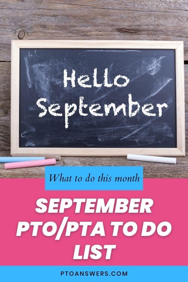 blackboard with chalk month name on weathered brown wooden plank background with pink and blue accents