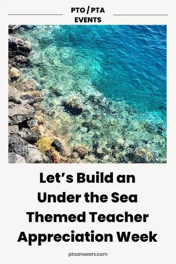 rocky beach at water's edge with turquoise water