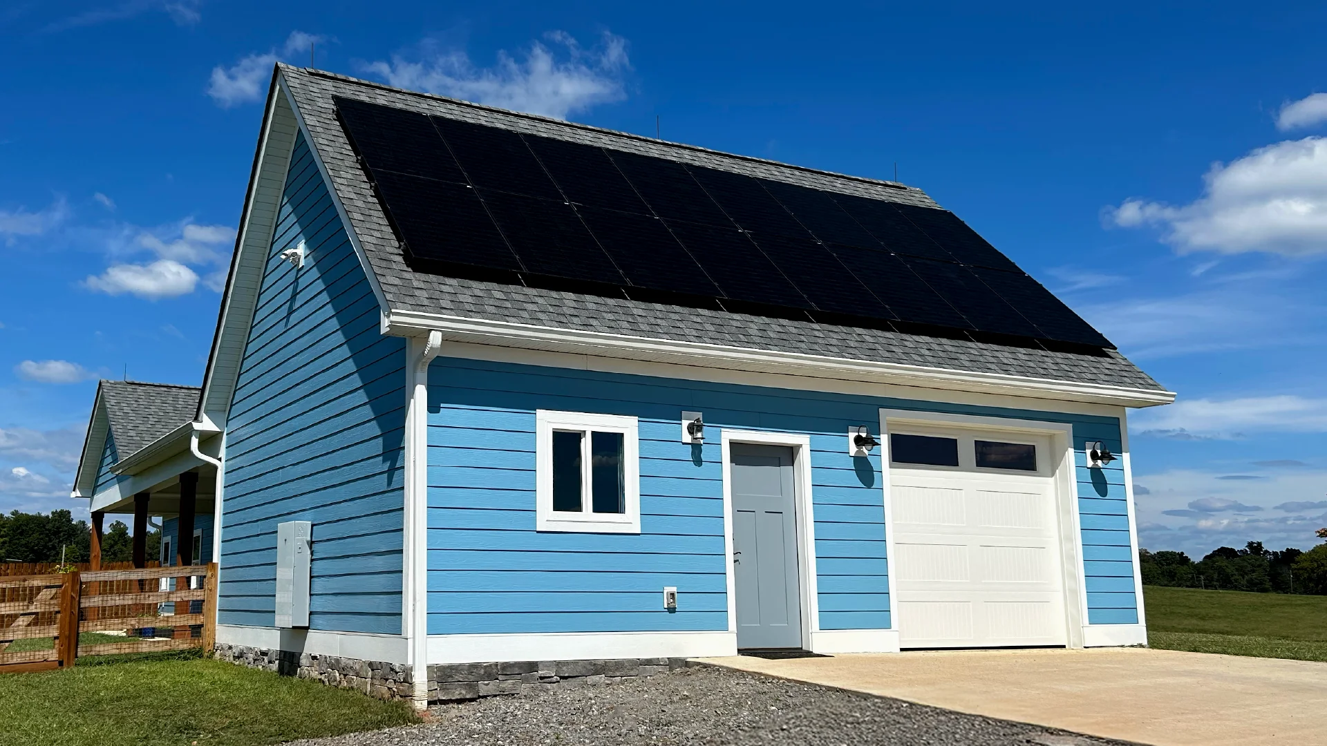 blue home with solar and battery