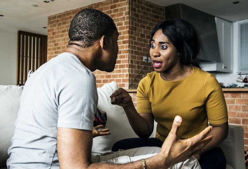 couples qurreling boxing gloves, marital conflict