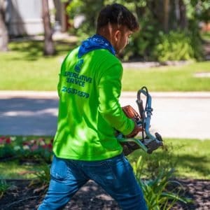 Superlative Service man walking and holding tiller