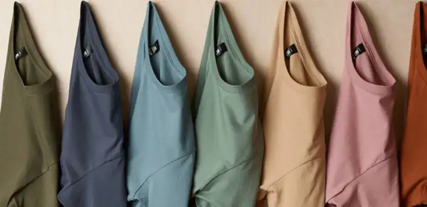 AS Colour t-shirts hanging in earthy tones for custom printing