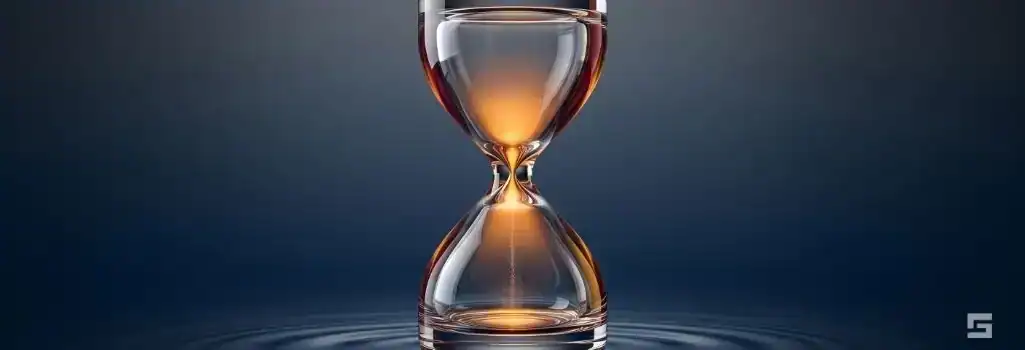 A clear glass hourglass illuminated by warm amber light over water ripples on a navy blue background, representing the timeline for insurance companies to handle accident injuries. Personal injury resources from Grano Law Offices, P.C.