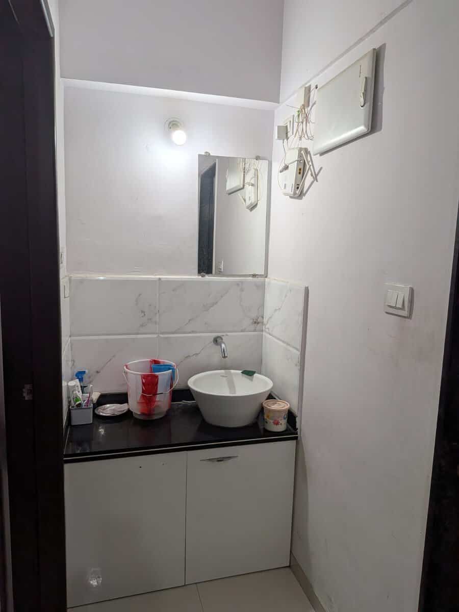 Wash basin vanity counter with storage in Estella Wakad rental 2 BHK