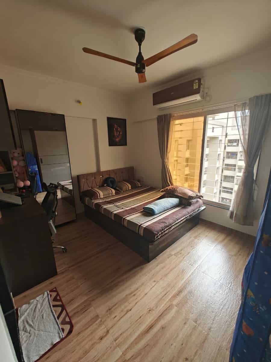 Air conditioned master bedroom with upholstered bed GK Aarcon Punawale rental