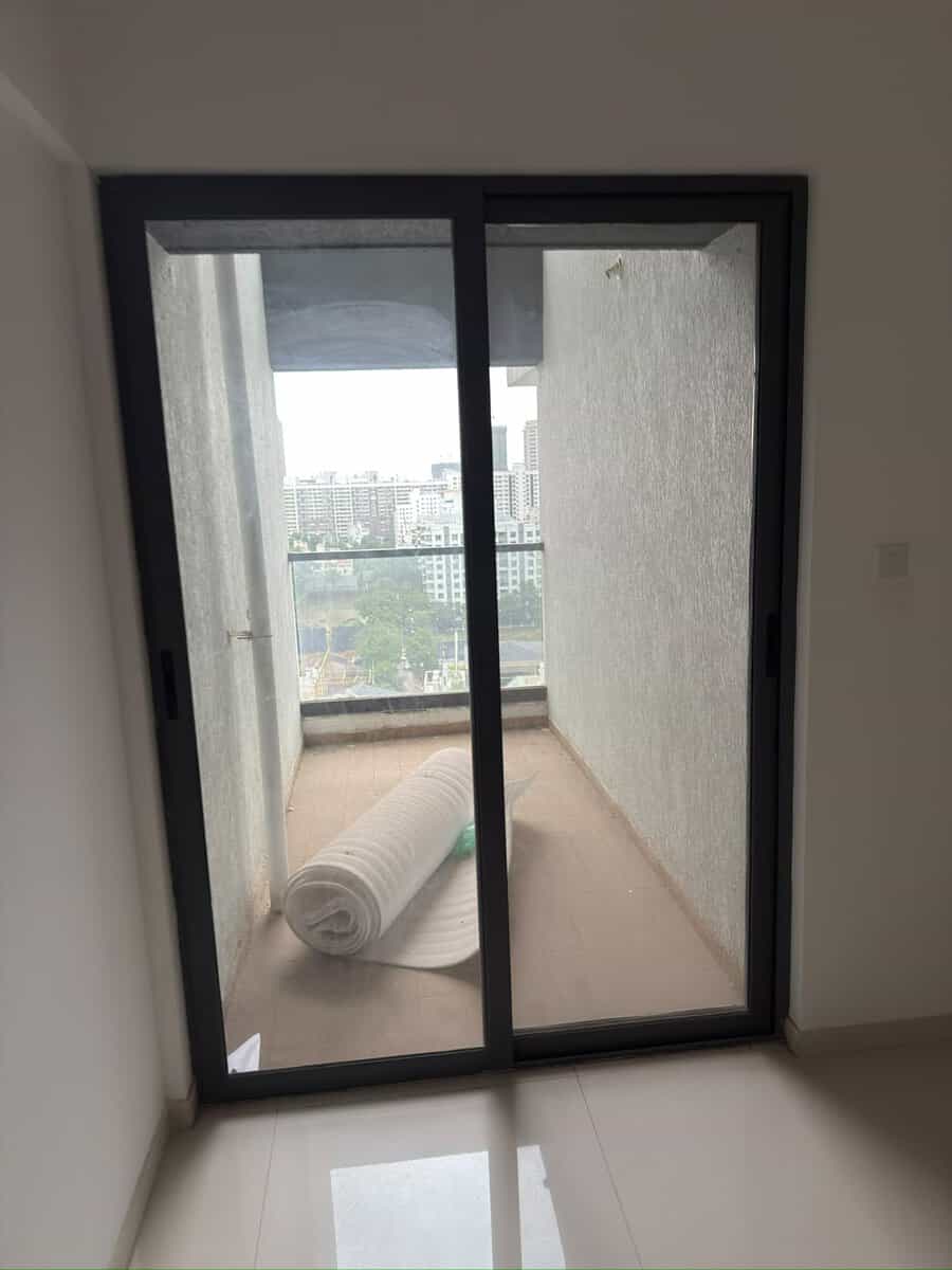 Balcony with glass sliding door in 2 BHK flat on rent at Majestique Signature Balewadi High Street Pune