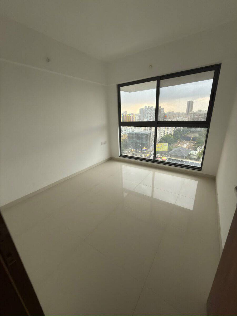 Master bedroom with full-height window and city skyline views at Majestique Signature Towers Balewadi near Baner
