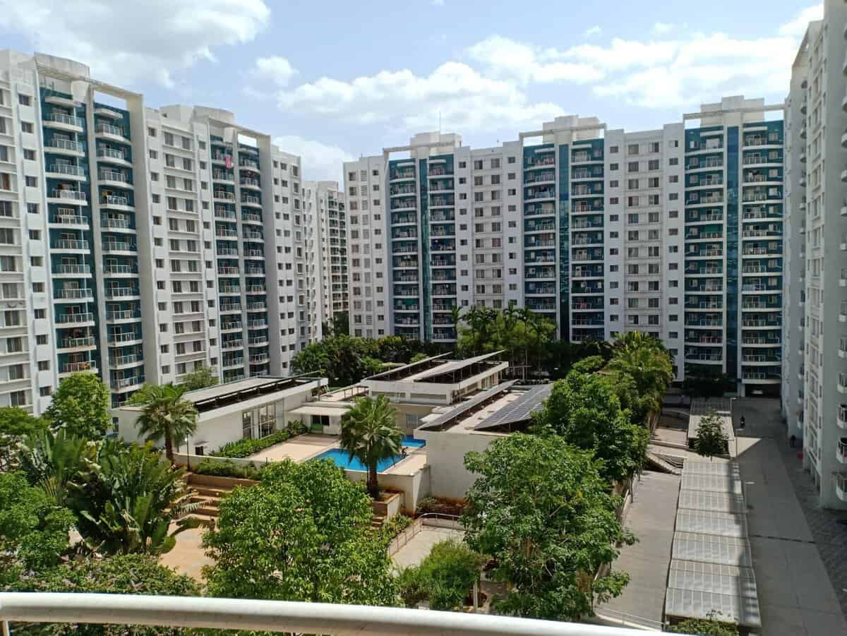 Megapolis Splendour Hinjewadi Phase 3 towers with swimming pool and central garden – 2 BHK for sale view