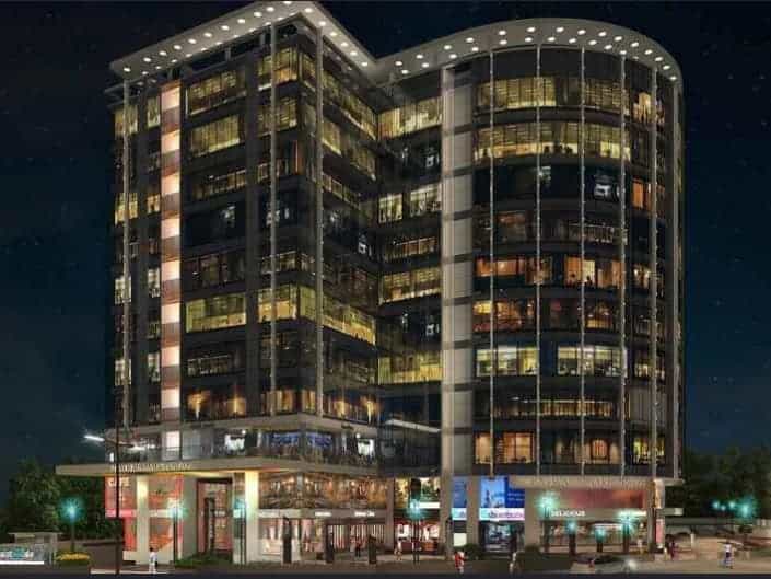 Suratwala Mark Plazzo commercial tower night elevation showing lit office floors in Hinjewadi Phase 1 Pune