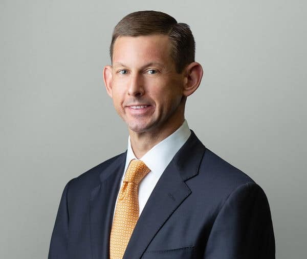 Professional headshot of Austin T. Lee from the law firm Paul, Weiss, Rifkind, Wharton & Garrison.