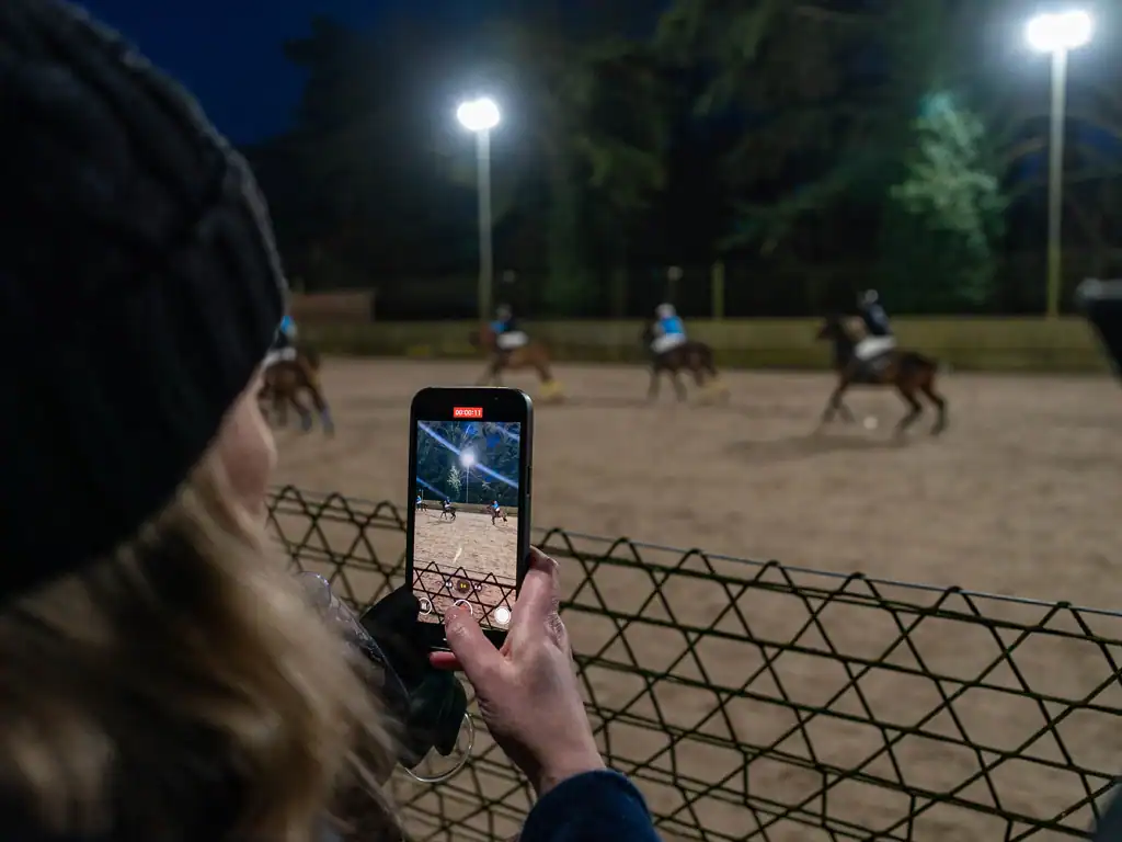 Videoing the incredible arena polo action at the office christmas party