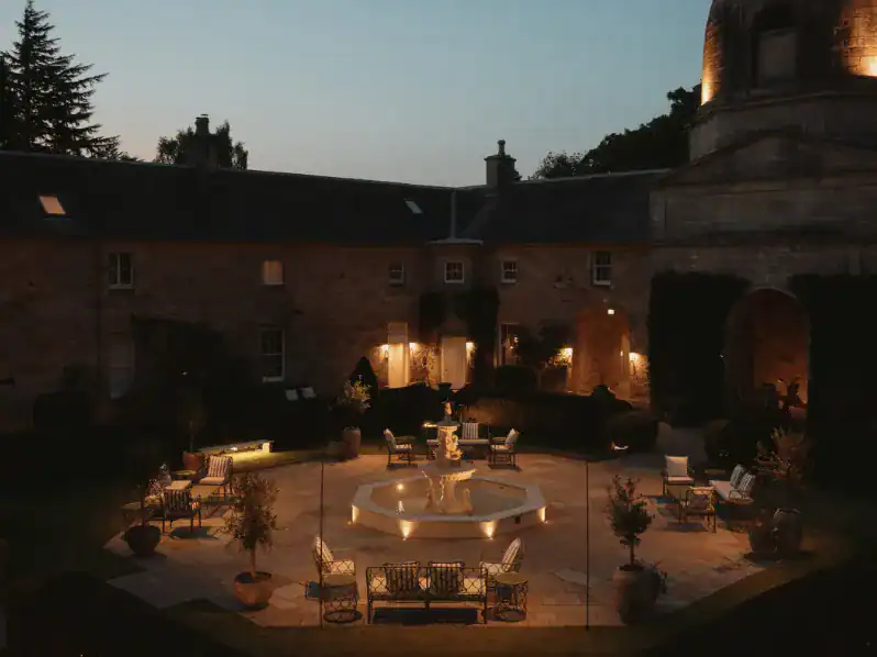 Penicuik House lit up at night 