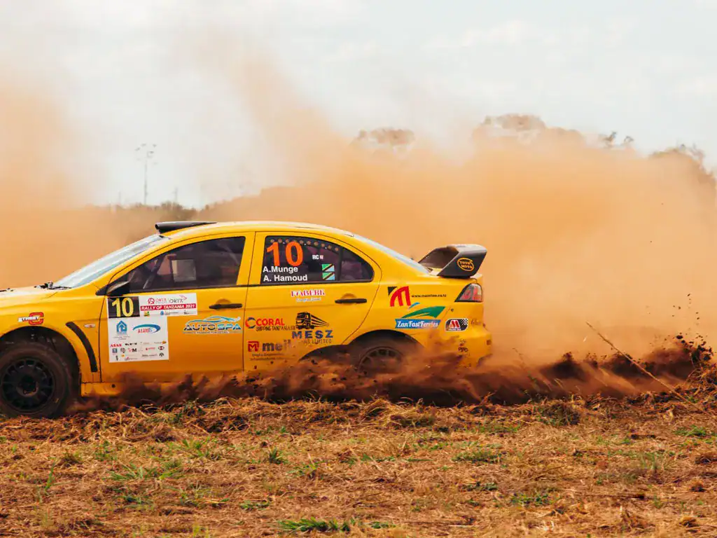 rally driving in dirt track