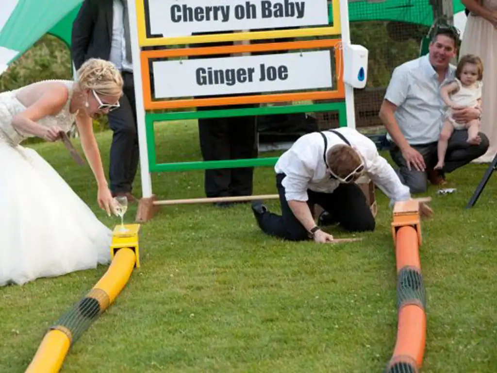 bride taking part in ferret racing&nbsp;
