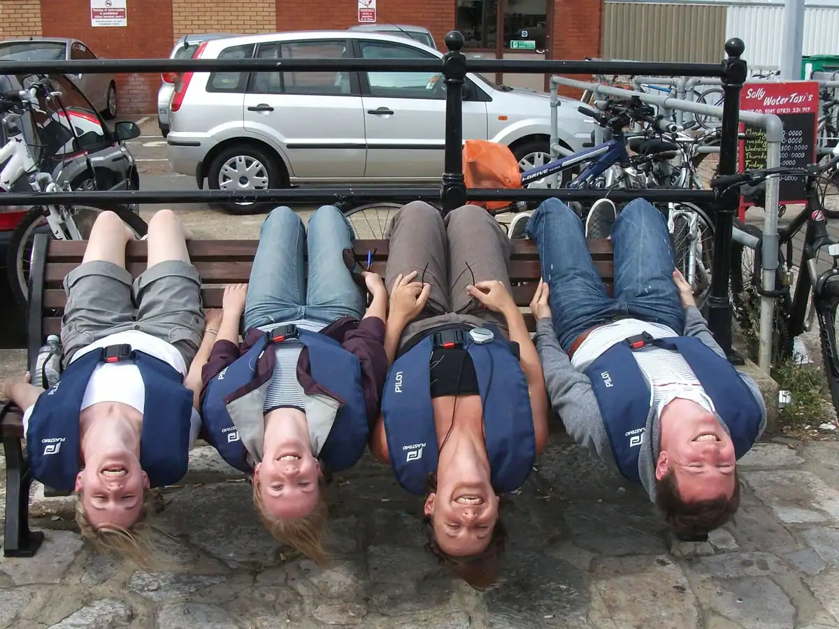 clients posing upside down during a treasure hunt event&nbsp;